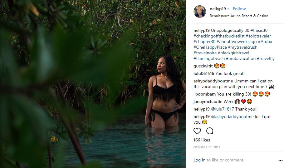 Instagram-User-Photo-at-nellyp19-celebration-destination-Aruba-You-Should-be-Here-location-tag-birthday-trip-vacation-woman-standing-in-water-with-mangroves-mangel-halto-beach
