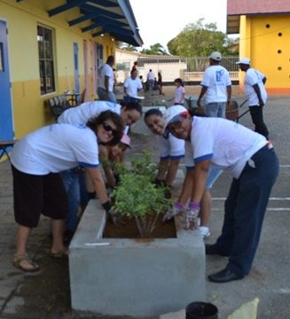 Planting fruit and vegetable trees at Fatima College.JPG
