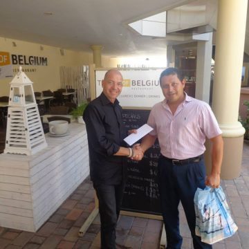 Jorge Ospina wins grand trip to Antwerp with tombola event at Taste of Belgium in Aruba