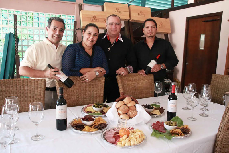 Sweet Peppers restaurant staffers take a class in fine wine from Aruba Trading Company representatives
