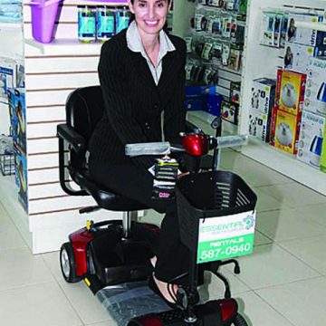 Owner of Essential Health Supplies on a Mobility Scooter
