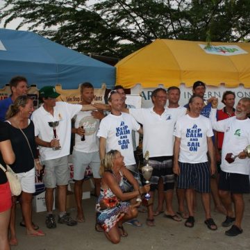 Micro boat sailors with trophees and boats.jpg