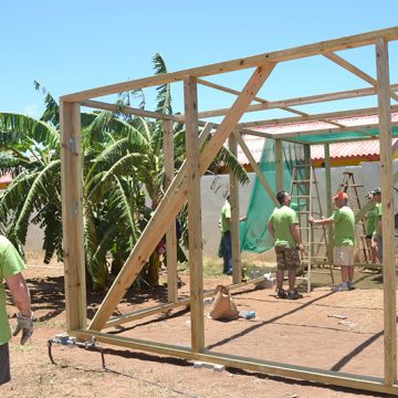 Watering-Plants-After-Finished-Greenhouse.jpg