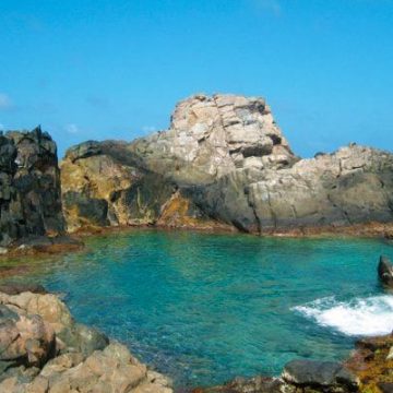 Aruba's Natural Pool is named as one of the world's twelve best spots for wild swimming