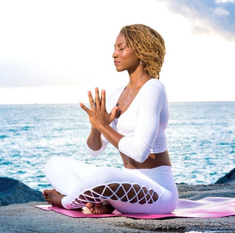 koya-web-practicing-yoga-in-aruba-at-hilton-resort