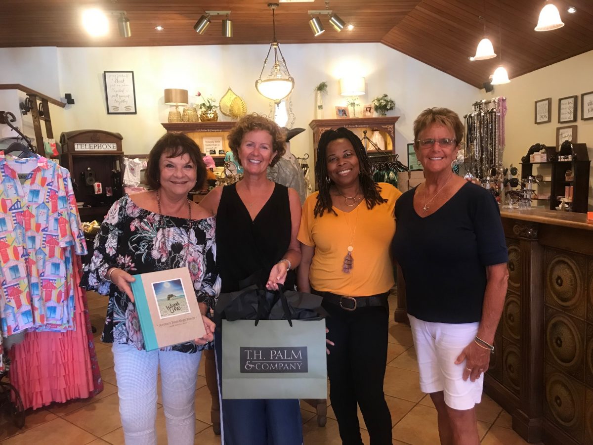 Winner of free trip to Aruba through a raffle of T.H. Palm & Company